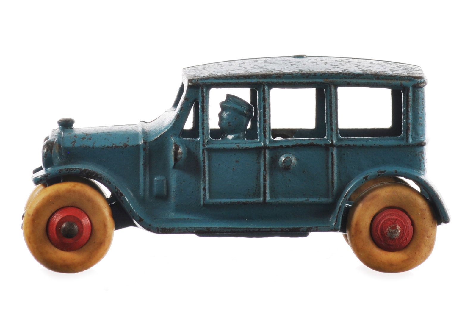 Blue Dent Toys Cast Iron Sedan: Difficult to find blue Dent Toys cast iron sedan in original paint. A great condition example with proper wheels and axles. The toy shows light play wear, otherwise, very good condition. Circa 1927.