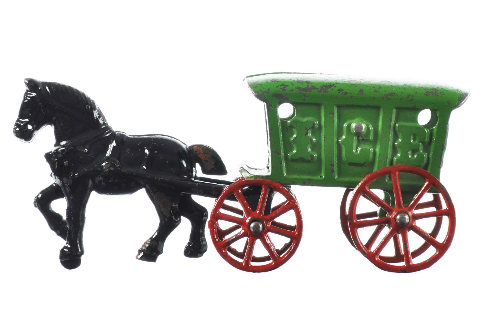 Hubley Horse-Drawn Ice Wagon Cast Iron: Early Hubley cast iron ice wagon with glossy green body and bright red wheel accents. The toy retains very clean original paint and sits at approximately 8" L.