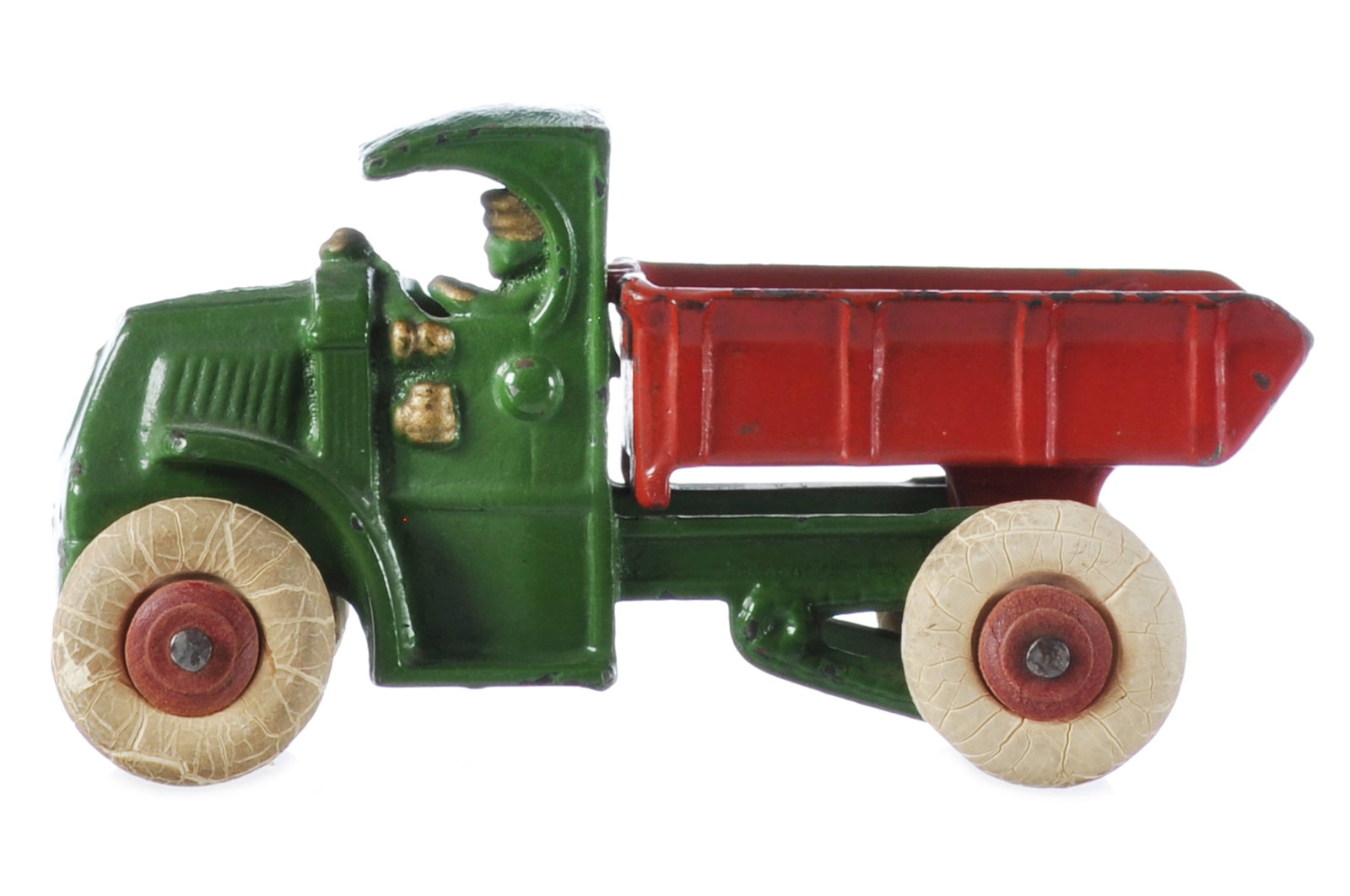 Hubley Mint Mack Dump Truck Green and Red Cast Iron: Cast iron Mack C-cab toy by Hubley with near mint original tires and strong gold highlights. A fun cast-in driver with a steering wheel and extra strong overall condition. It measures approximately 5"