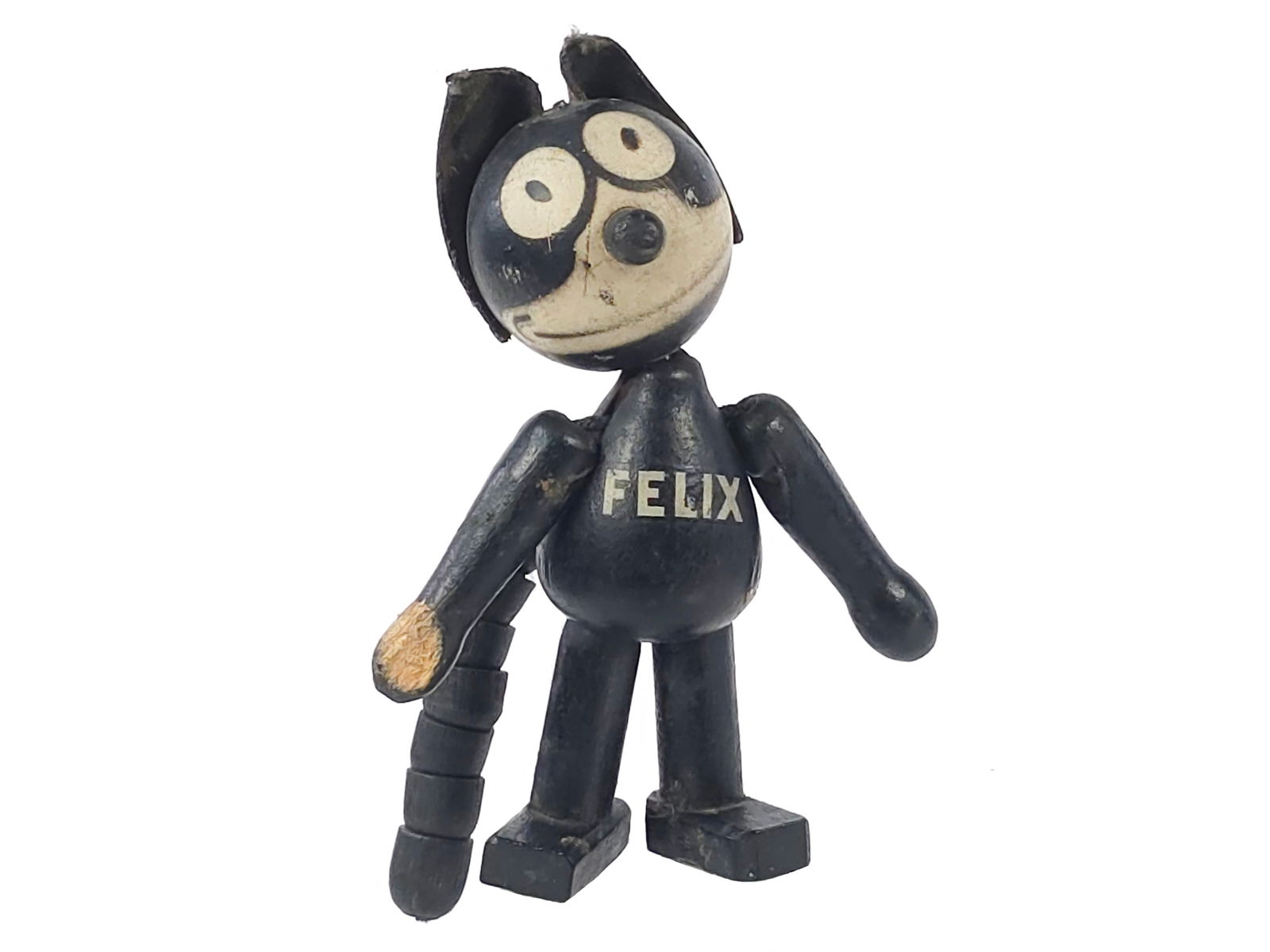 Schoenhut Felix the Cat Wooden Jointed Figure: Wooden jointed Schoenhut medium Felix the Cat marked with the Pat. Sullivan June 23, 1925 patent. His strings are a bit loose; he can stand, but it is difficult. He measures approximately 4.5" H.
