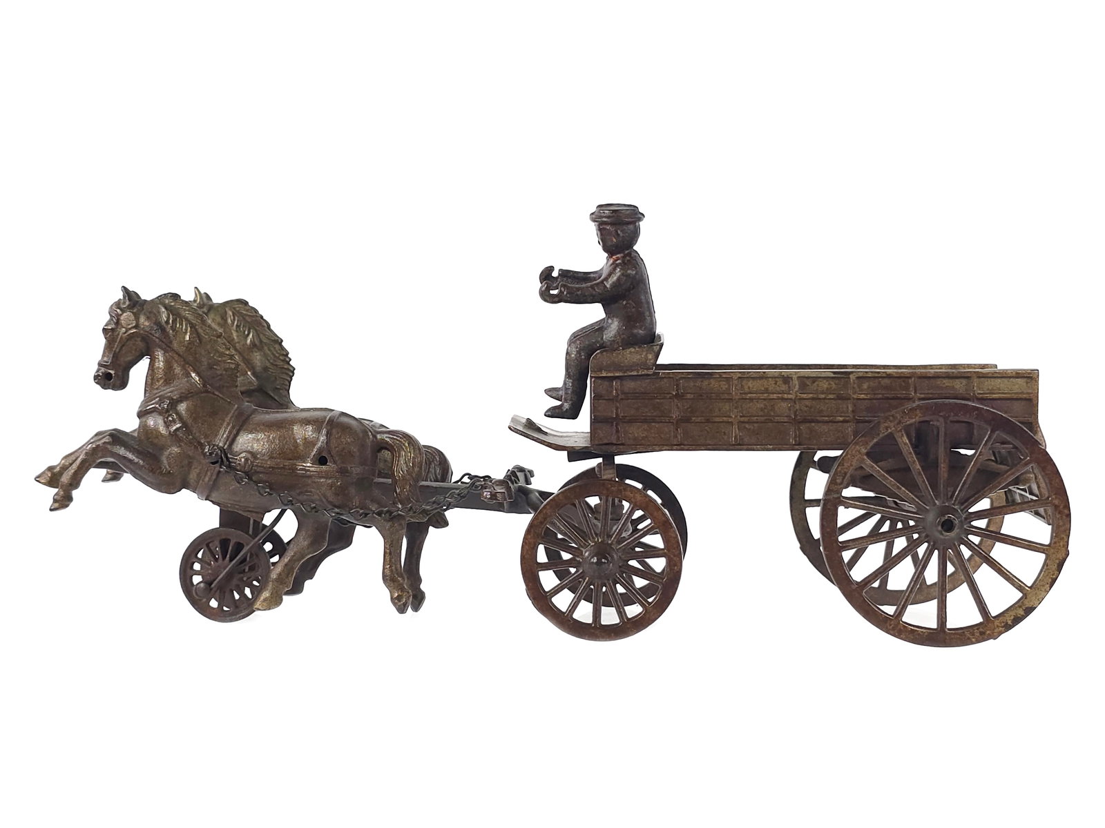 Shimer Cast Iron Grocery Wagon: Grocery wagon variation by Shimer Toys No. 400 featuring a great plated finish with darkened patina. The driver is replaced, but the wheels appear original with impressive horse castings. A challengin