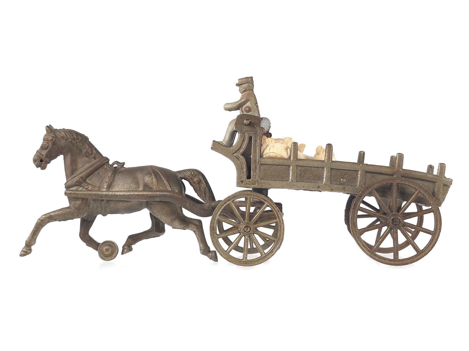 Ives Horse-Drawn Stake Truck Cast Iron: Ives Toys stake truck with rider featuring a mellow nickel-plated finish. A great toy from the 1890s and an outstanding survivor. It measures approximately 16" L.