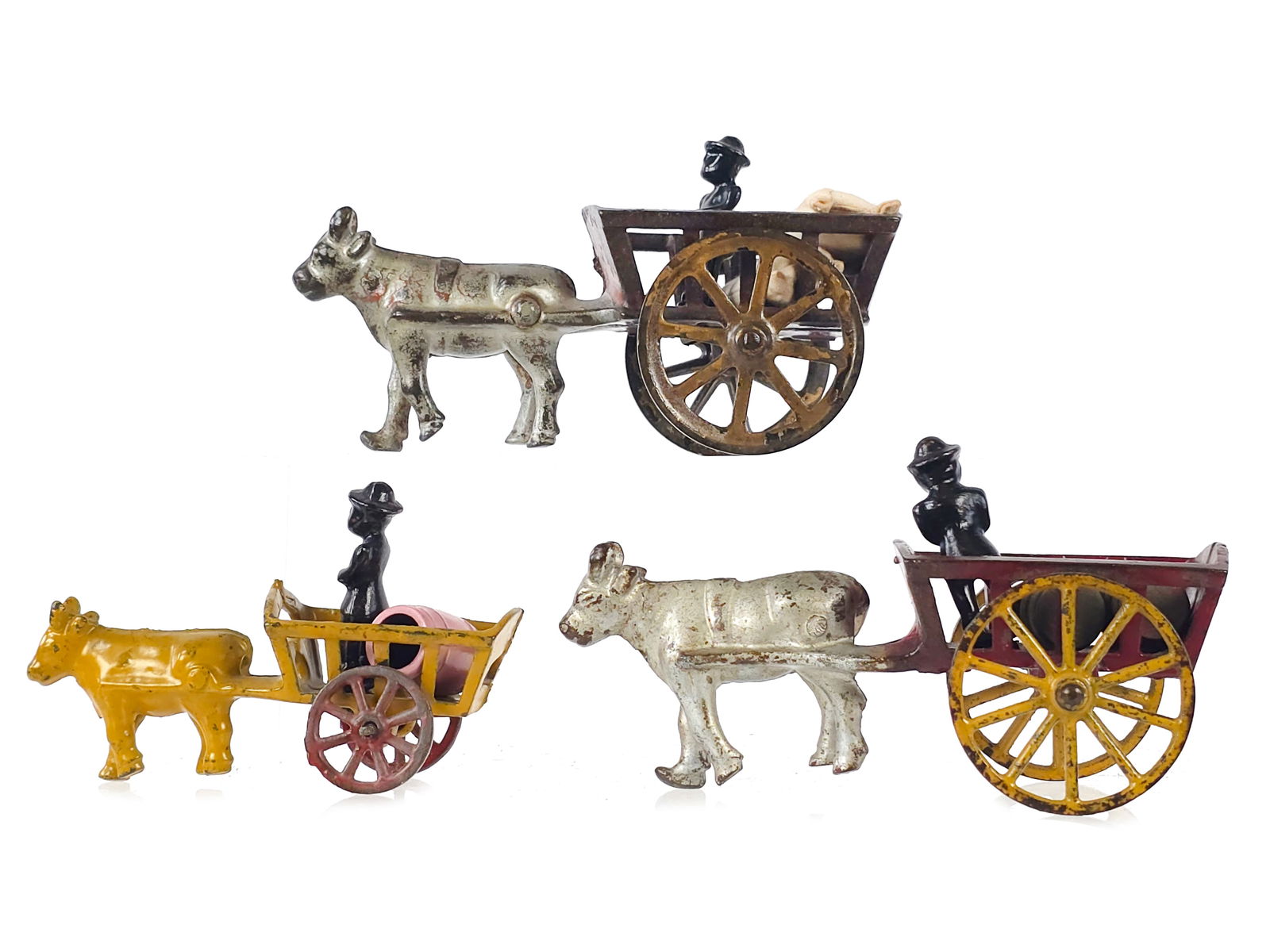 Trio of Cow-Drawn Hay Carts by Hubley and Shimer (1 of 6)