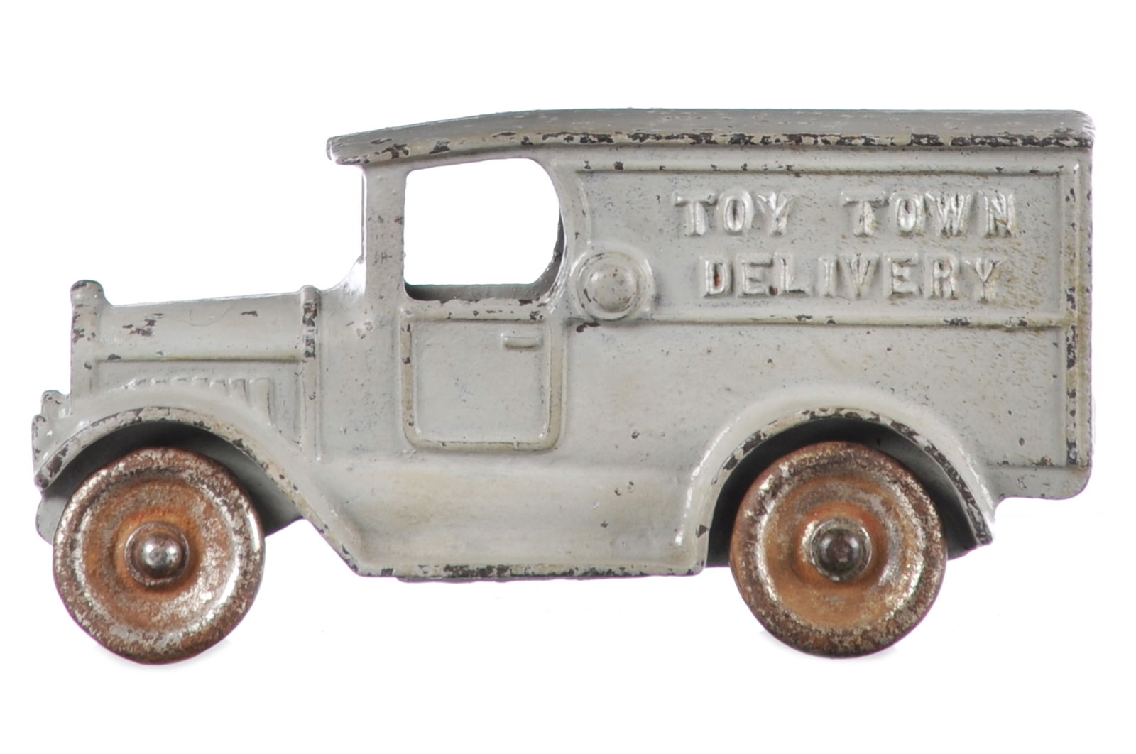 Sought After Grey Toy Town Delivery Cast Iron Kilgore: Kilgore Toy Town Delivery in an original and unusual grey color. Toys in this color were early and tended to be circa 1927. Original steel wheels. It measures approximately 6.25" L.