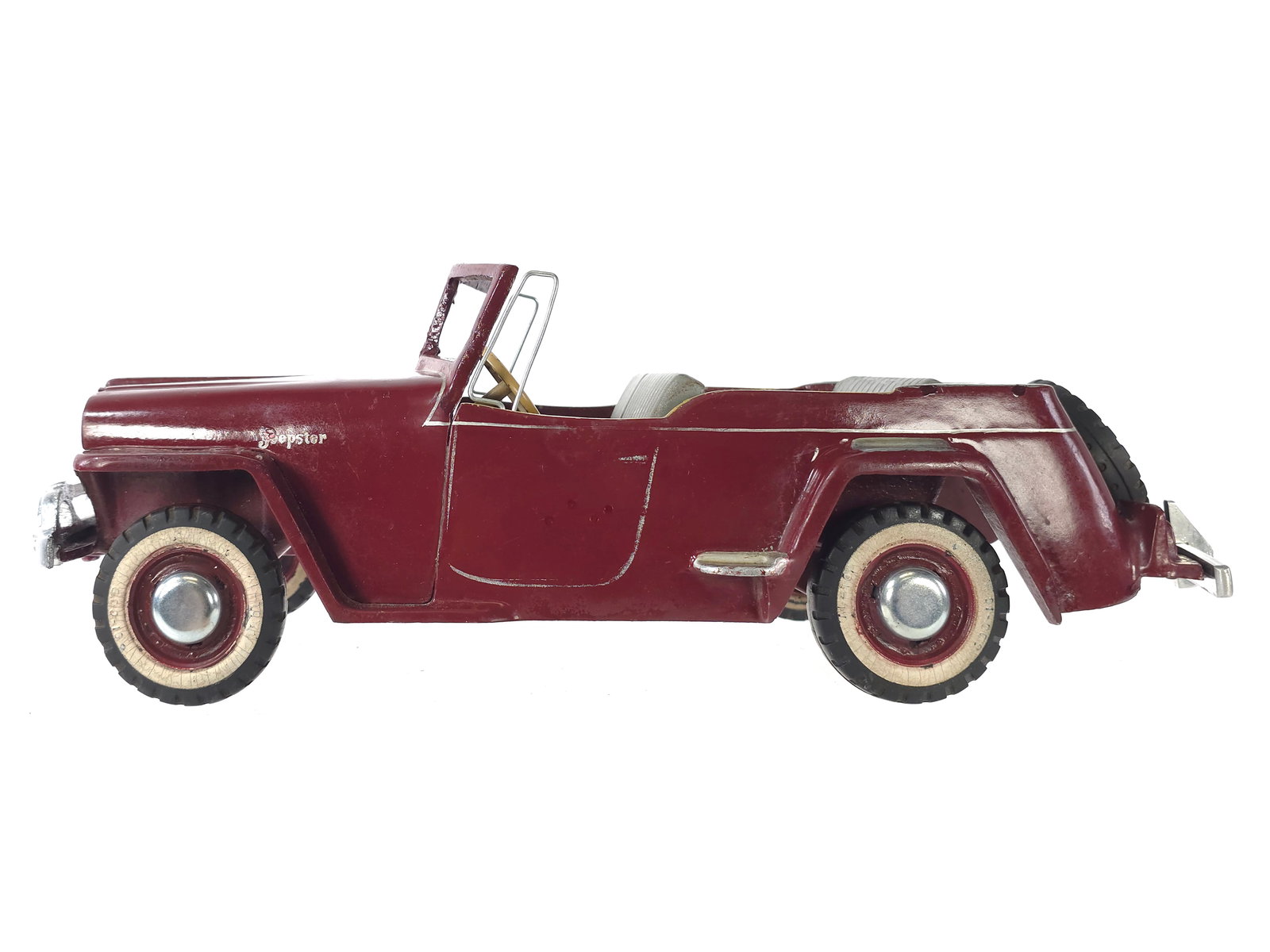 Al-Toy Willys Jeepster Large Scale Promo Truck Ca. 1948: Very large and substantial “Al-Toy" aluminum promotional Jeepster with top down. Likely produced as a promotional item, this example captures the post-World War II civilian Jeep design with impressi