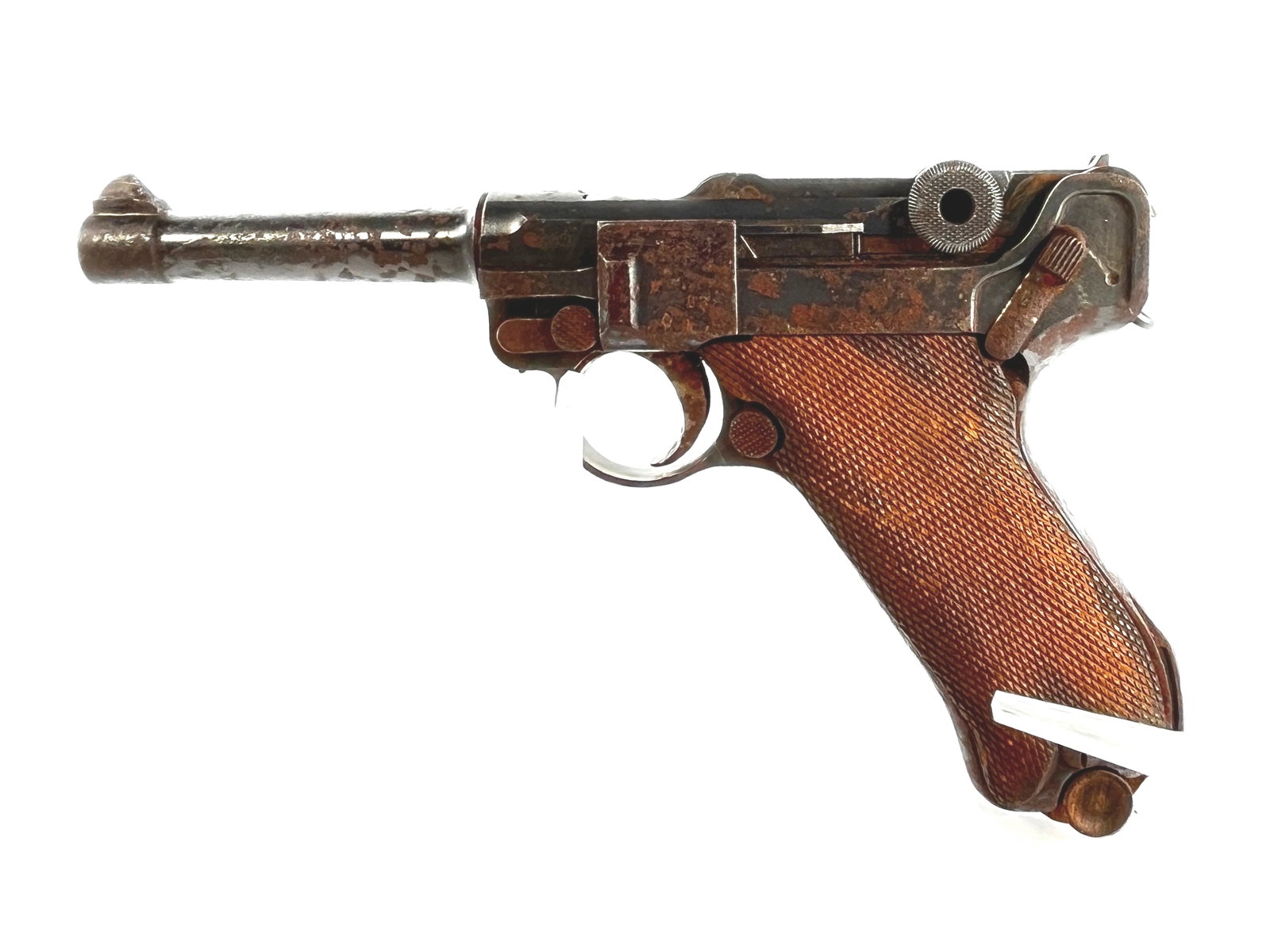 DWM Luger P08 9mm Ca. 1918: DWM Luger P08 pistol dated 1918 and chambered in 9mm Parabellum. The action functions properly. The exterior shows pitting and rust consistent with age and storage. Includes wood-bottom magazine. The