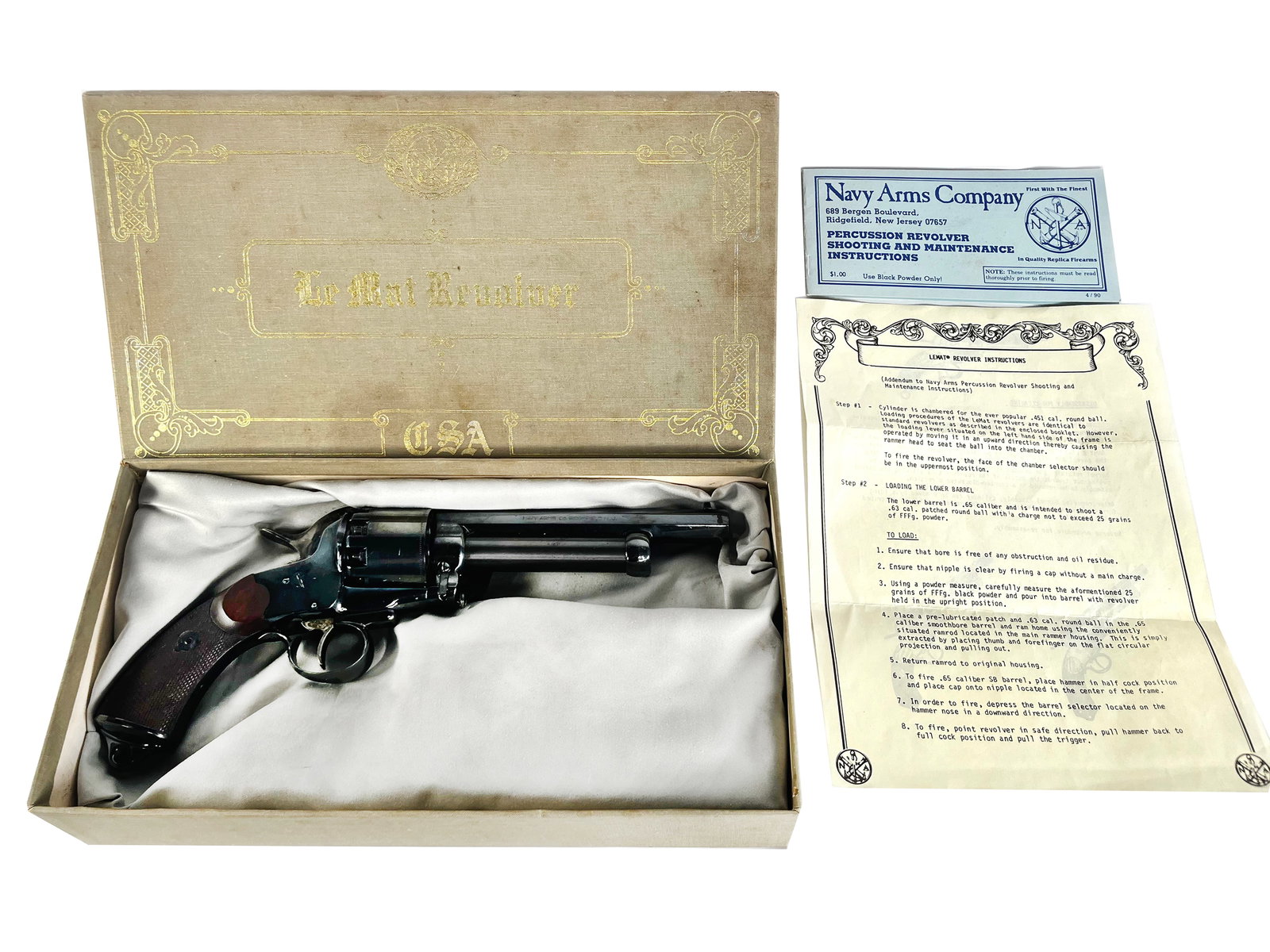 Navy Arms Company Le Mat Percussion Revolver: Navy Arms Company Le Mat percussion revolver chambered in .451 caliber. The action functions properly. This example includes the original box and accompanying paperwork, making it a highly desirable