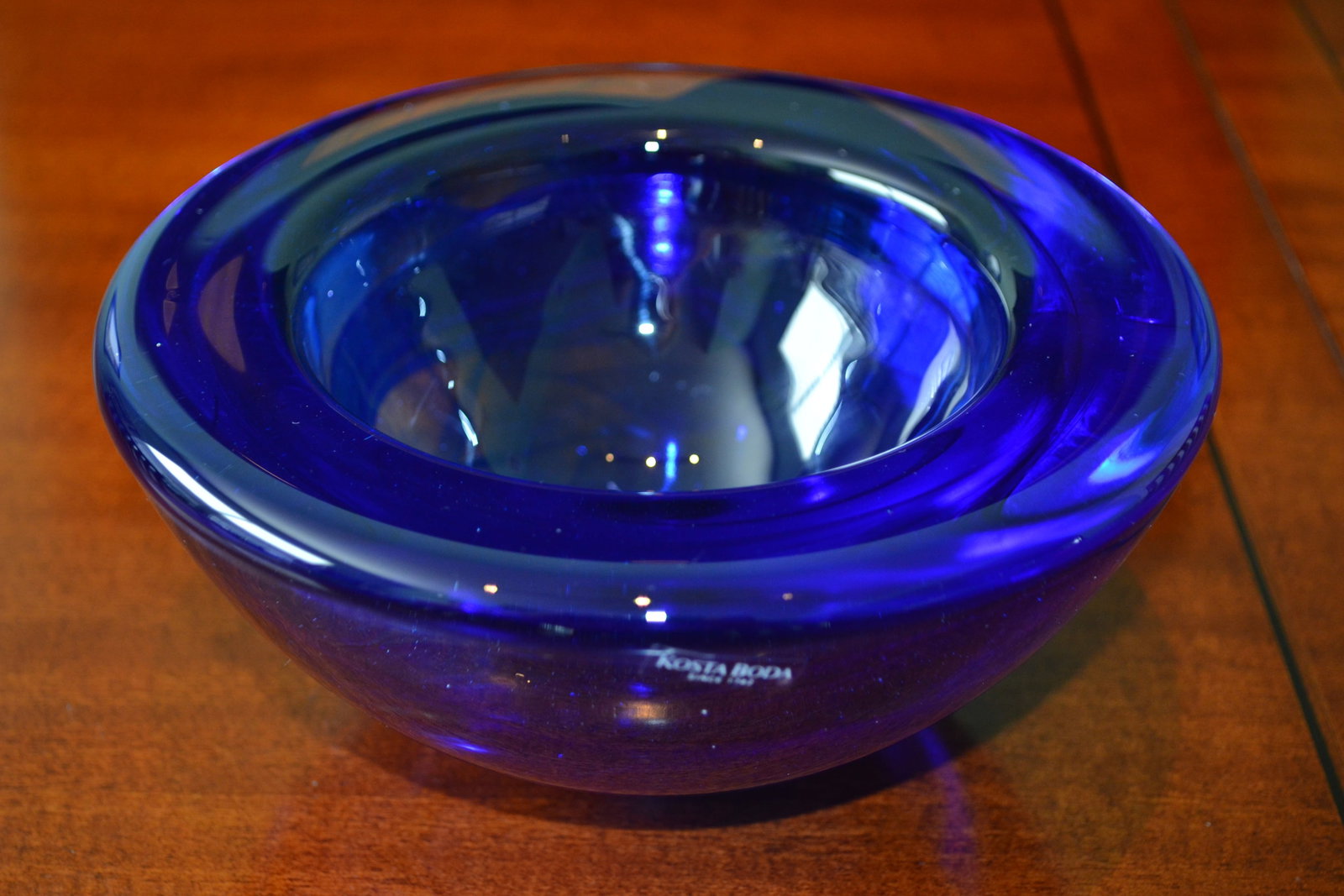 Kosta Boda Cobalt Blue Swirl Atoll 7" Bowl: Vintage Crystal Kosta Boda 7" Cobalt Blue Bowl. by Anna Ehrner "Atoll" Collection Crafted in Sweden Crystal Bowl Discontinued - Measures 6.875 inch across x 3.25 inch height; glass is .44 inch thickne