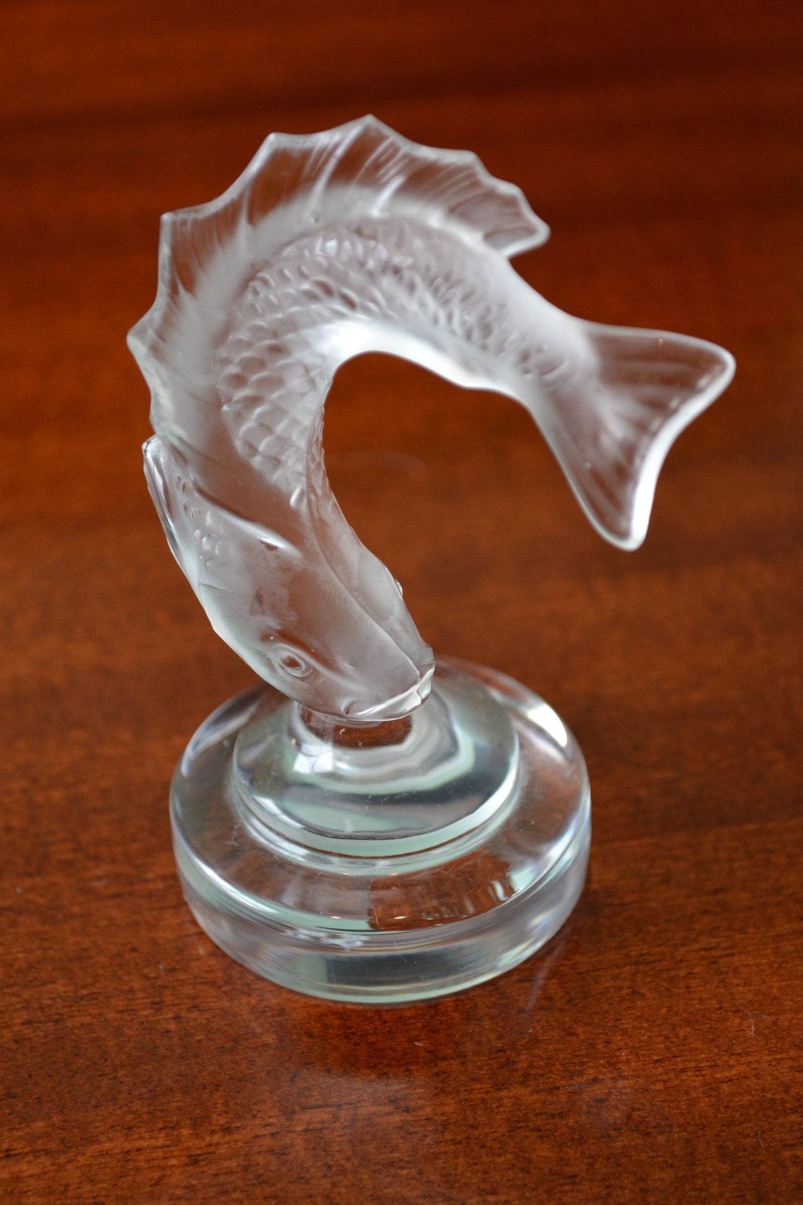 Lalique Crystal Goujon Jumping Koi Fish Figurine: This Lalique Jumping Koi Fish or "Goujon" is a lovely desk accessory or paperweight The fish portion is frosted. It's in excellent condition signed in diamond pen Lalique France. It stands 3.75" high 