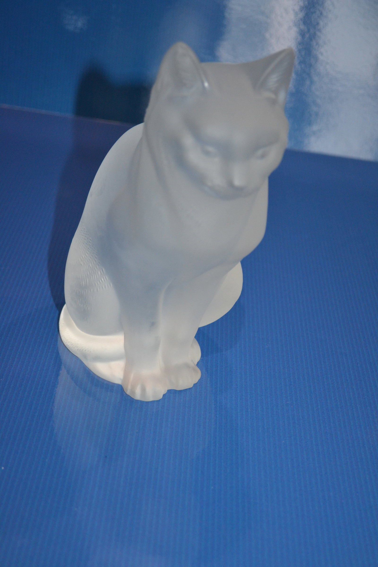 LALIQUE Sitting Cat Figurine Frosted Crystal 8.25H: LALIQUE Sitting Cat Figurine Frosted Crystal "Chat Assis" Signed engraved "Lalique France" It is molded from the finest lead crystal at the Lalique workshops in France. The production process can requ