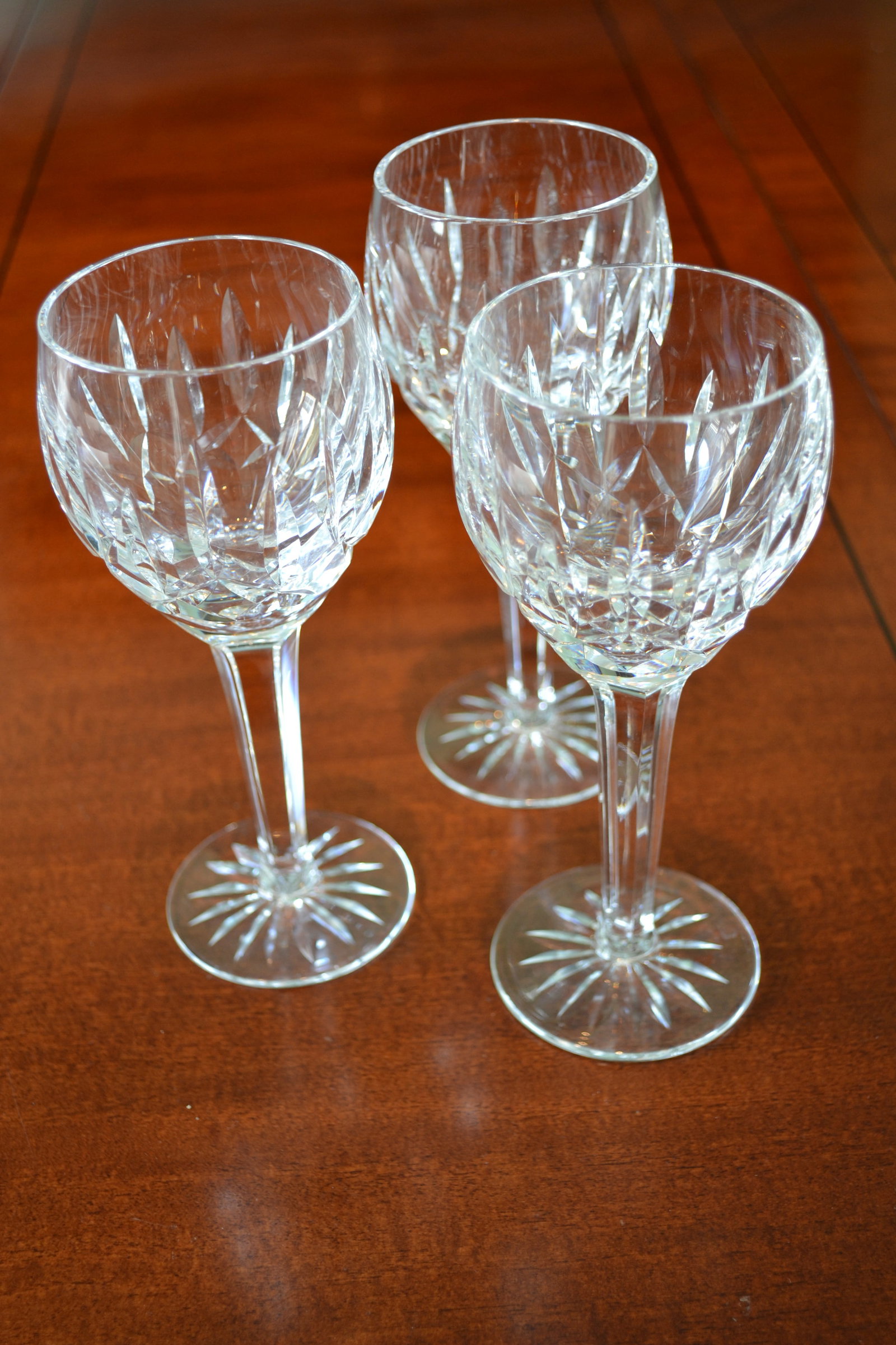 Waterford Kildare Claret Wine Crystal Stemware 7": Waterford Kildare Claret Wine Crystal Glasses 7" Stemware Cut Base Set of 3. Circa 1980's Made in Ireland. Waterford etch backstamp Measures 2.5 in width x 7 in Height Excellent condition No box
