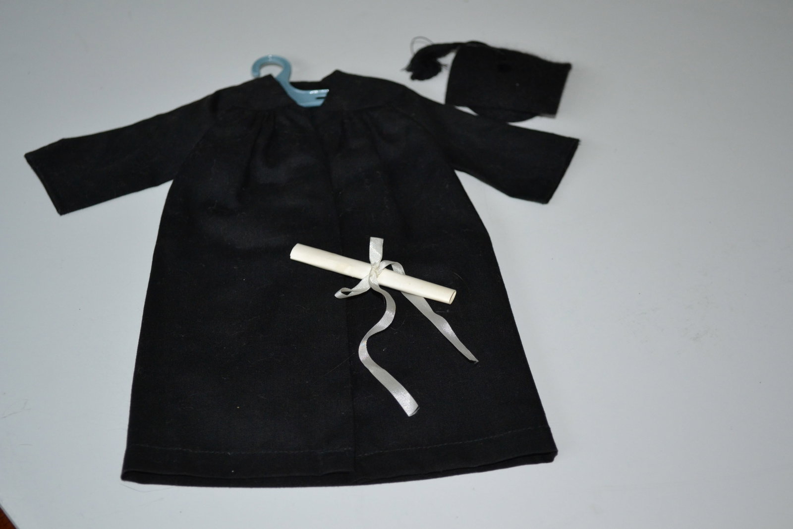 Mattel Ken Graduation Attire 0795 Outfit 1960's: Mattel Ken Graduation Coat 0795 Complete Outfit 1960's In his traditional black gown and mortar board tassel hat Ken receives his diploma.
