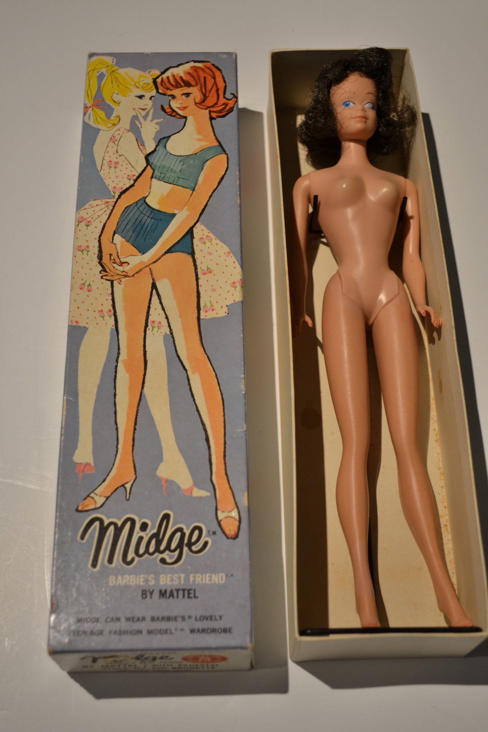 Midge Barbie's Best Friend No. 860 in Original Box: Midge Barbie's Best Friend by Mattel with Pedestal Stock No. 860 Brunette in Original Box and stand 1962 Made in Japan Midge's face shows delamination but body is perfect. Also included is another Mid