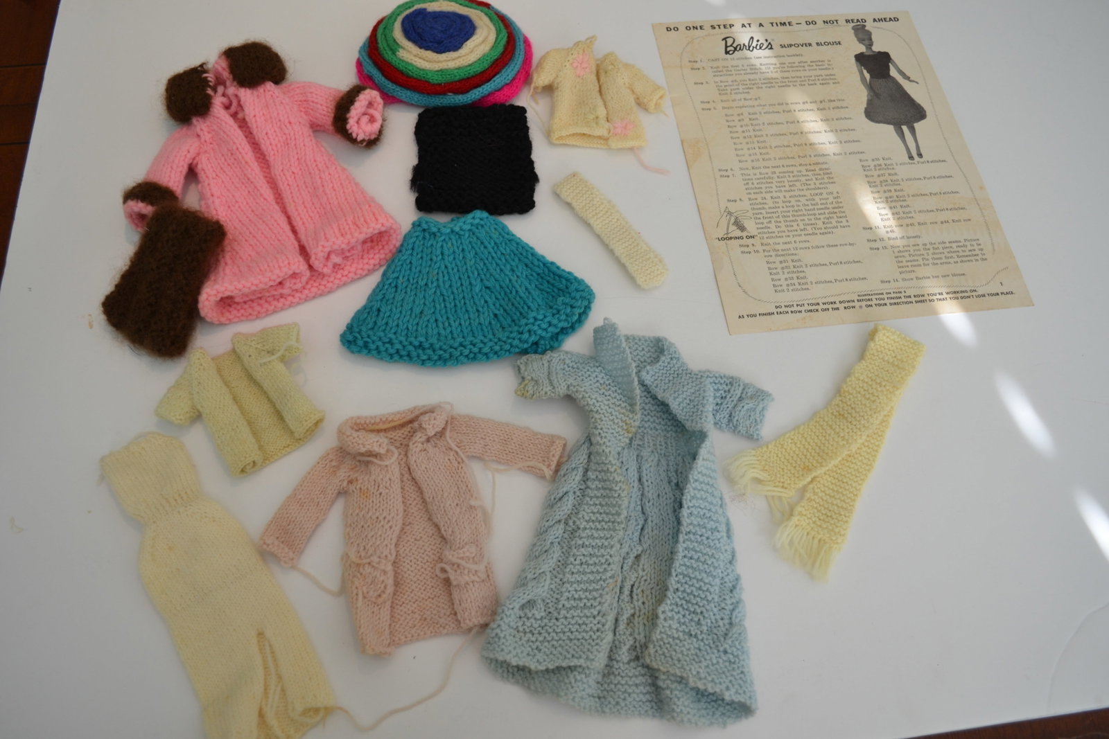 Barbie Doll Clothes Handmade Knitted or Sewed: Barbie Doll Clothes Handmade Knitted or Sewed 1960's A collection of doll clothes very unique.