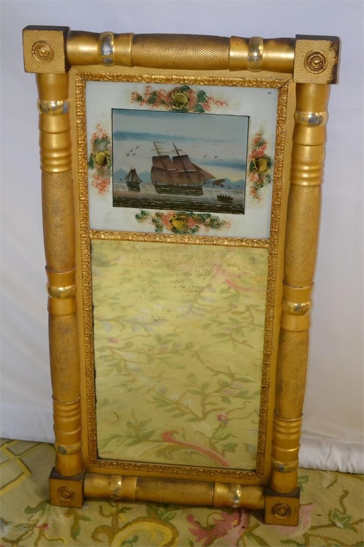 ANTIQUE GILT FRENCH TRUMEAU MIRROR: ANTIQUE GILT FRENCH TRUMEAU MIRROR depicting a Sailing Vessel on the Seas Good condition minor age-related chipping in spots.Measures 18.25" W x 35"H x 2.25"D