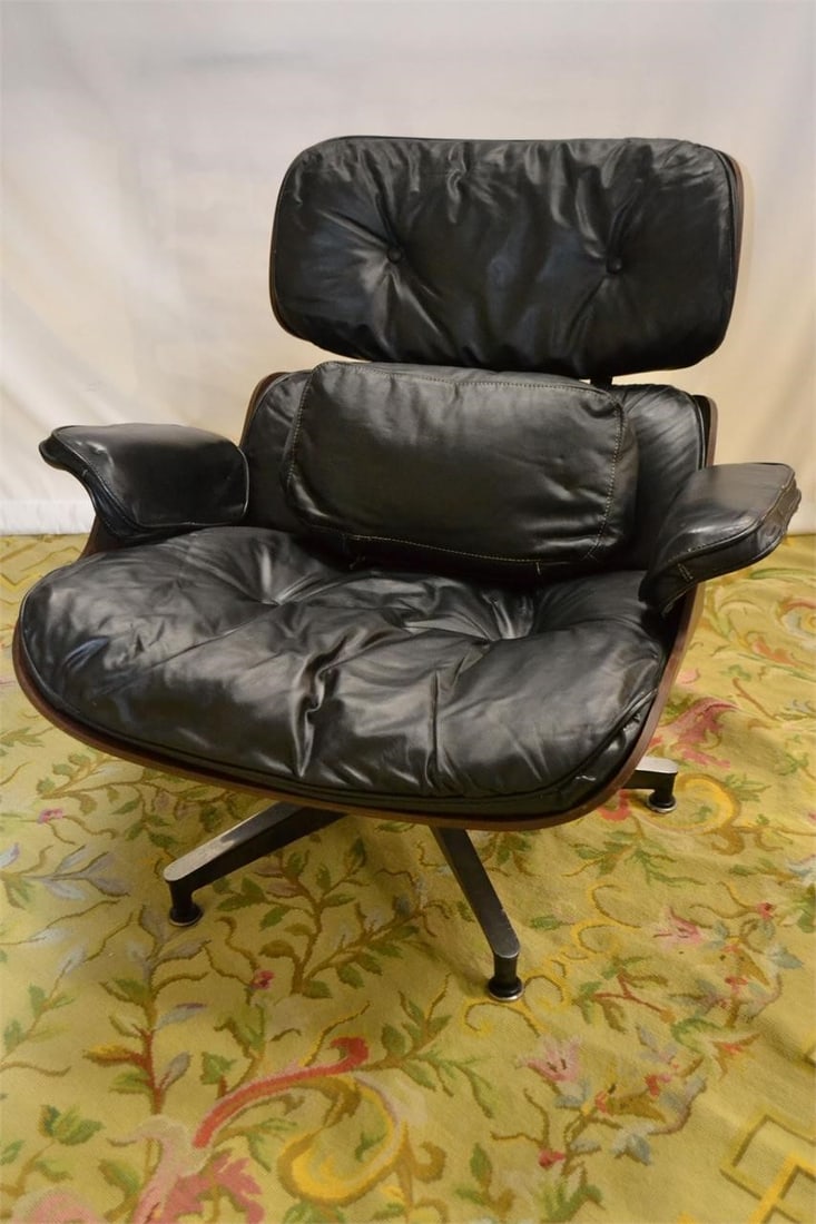 HERMAN MILLER EAMES LEATHER LOUNGE SWIVEL CHAIR: CHARLES EAMES for HERMAN MILLER Black Leather Swivel Chair Mid-Century LABEL 166 with back support pillow Five star base ALL ORIGINAL Excellent Condition Note small nick on arm see photo Measures 33"W
