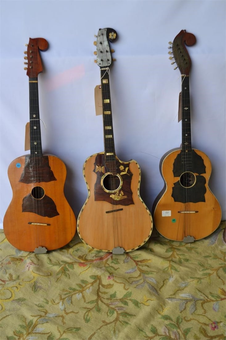 MUSICAL STRINGED GUITAR SET OF 3 MIXED SIZES: MUSICAL STRINGED GUITAR SET OF 3 MIXED SIZES Created from carved wood and decorative inlay. Iconic neck and body styles. Great Condition. Unknown Maker Provenance Slotin Folk Art Gallery Georgia