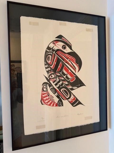 Native Art Roy James Hanuse Raven & Salmon: Raven & Salmon Artist Roy Hanuse (1943-2007) Serigraph Signed and Numbered "52/225" Native ArtistRoy James Hanuse was well-known for promoting and working in the traditional Kwakwaka'wakw style. He st