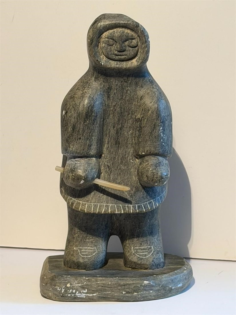 DIMU Stone Carving Hunter signed DIMU: Stone Carving Hunter Standing w/ Weapon signed DIMU. DIMU is actually the signature of a German-Canadian artist named DIETER MUCKENHEIM. The works are somewhat mysterious and quite sparse, however the