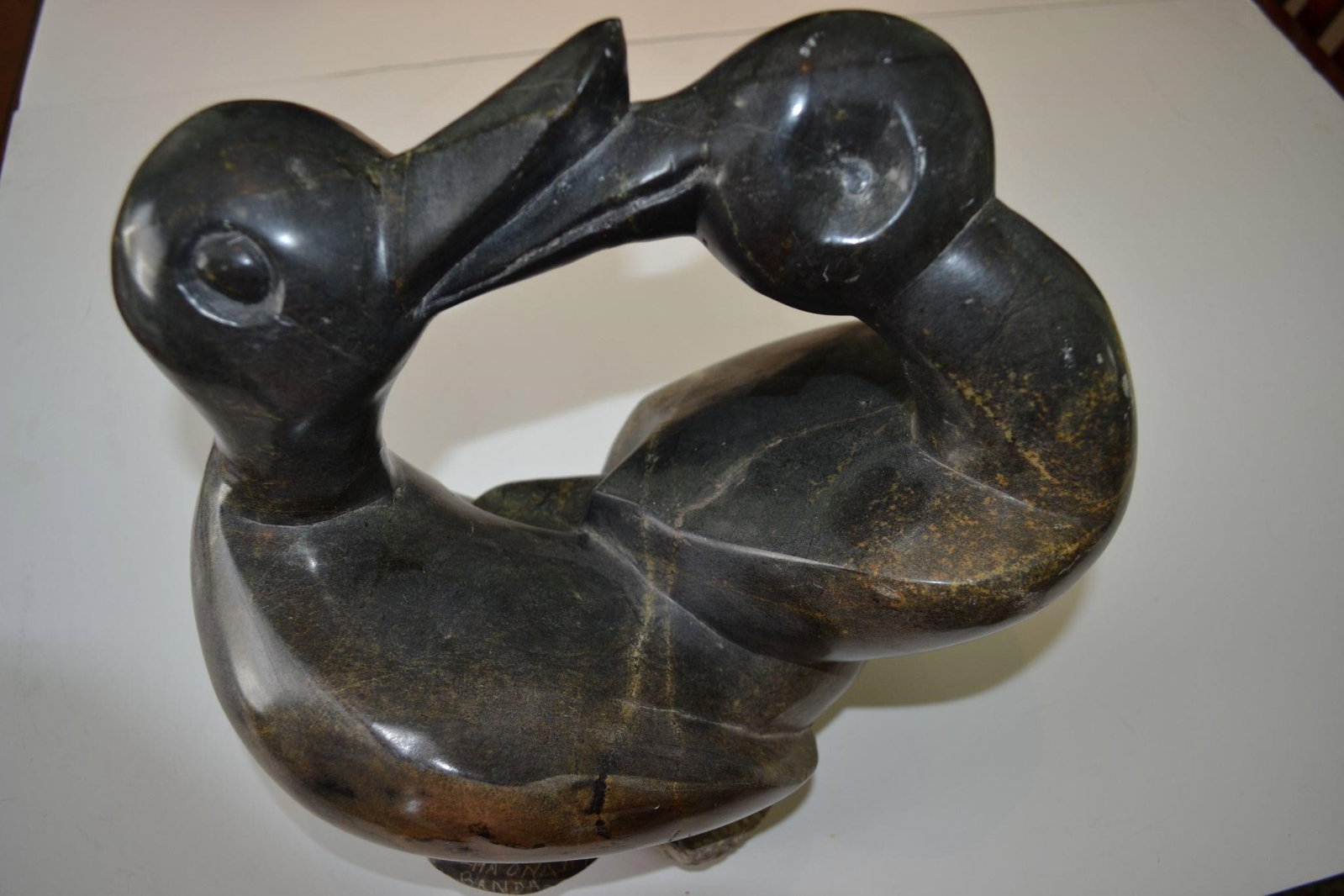 Hand Carved Stone Figural Sculpture Birds Signed: Hand carved Stone figural Sculpture Two Birds interlocked. Signed Tichaona Banda 1999 African Measures 11"W x 7" Deep x 11"HCondition Excellent