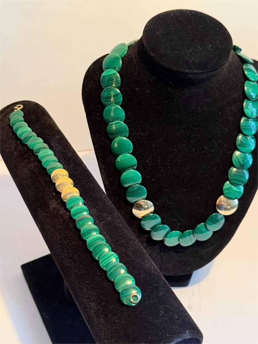 Malachite and 14Kt Gold Necklace and Bracelet Set: Malachite and 14Kt Gold Necklace and Bracelet Set Uniquely flat disc shaped design with 14 Kt Yellow Gold accents This jewelry set features a necklace and matching bracelet made from green malachite b