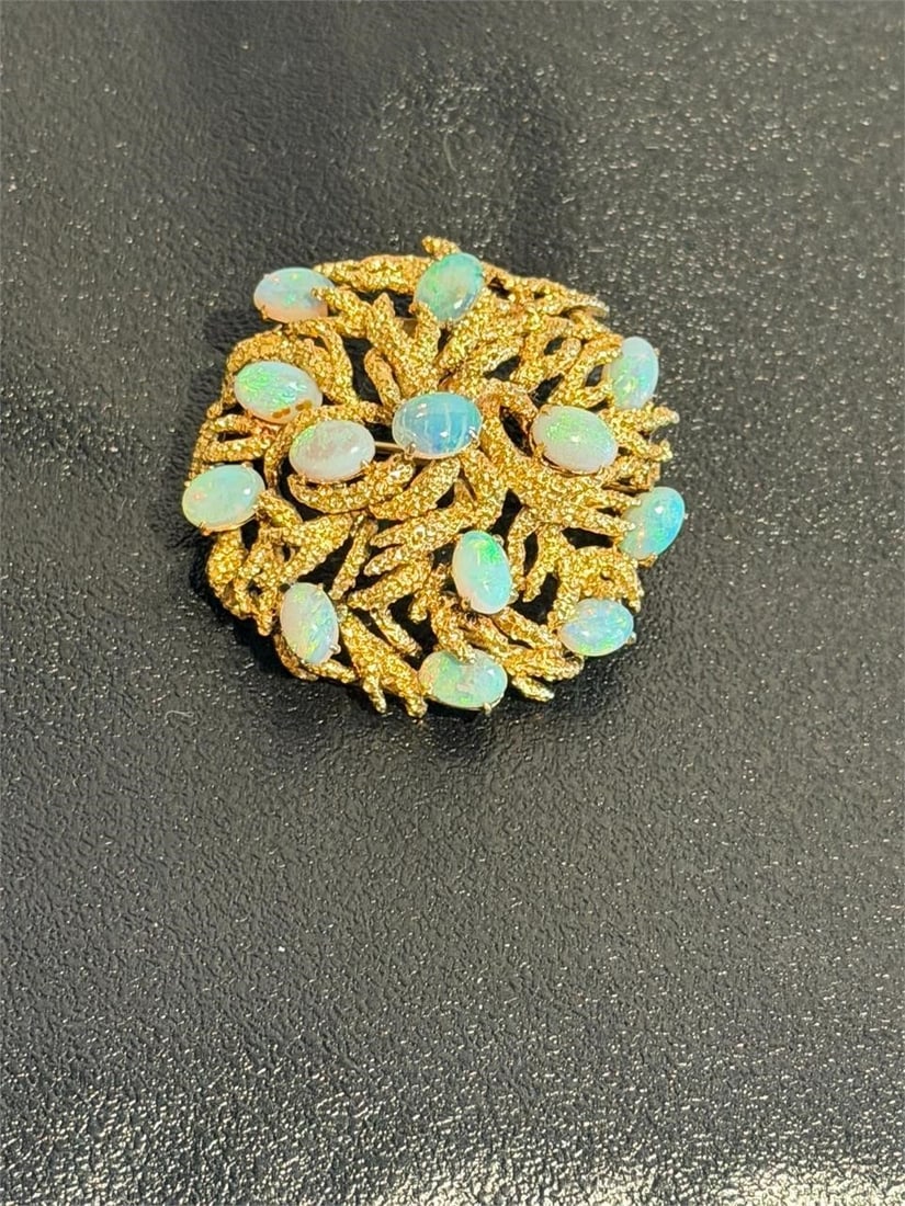 Vtg 14Kt Gold Round Cabochon Opal Brooch Pendant: Vintage 14 Kt Yellow Gold Round Cabochon Opal Pin Brooch Pendant features a textured leaf design. The design is a popular 1970s cluster style characterized by textured, twig-like, or leafy gold settin