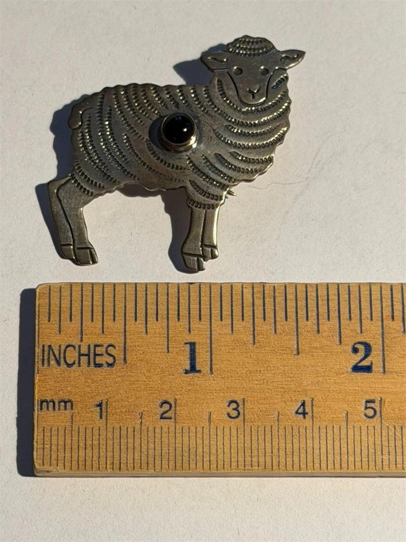Sterling Silver Lamb Pin with a Stone George Begay: Vintage Sterling Silver Lamb Pin with a Stone Handmade and Signed by George Begay George Begay is a renowned Navajo artist known for his unique jewelry designs, including sterling silver from the 1970