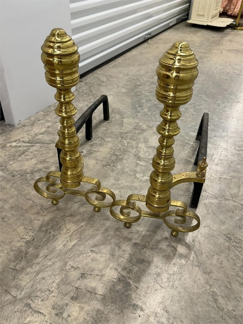 Vintage Brass and Iron Fireplace Andirons: Vintage brass and iron fireplace andirons, also known as fire dogs, featuring a traditional beehive or cannonball finial design atop a turned brass column and spurred legs. They are antique fireplace 