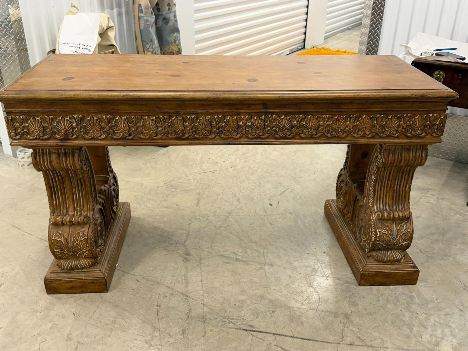 Pine Hall Buffett Console Table Carved Legs: Pine Hall Buffett Console Table Carved Pedestal Legs Neo-Renaissance style console table featuring a light wood finish and detailed carved pedestal legs. Measurements 24"D x 60"L x 32"H