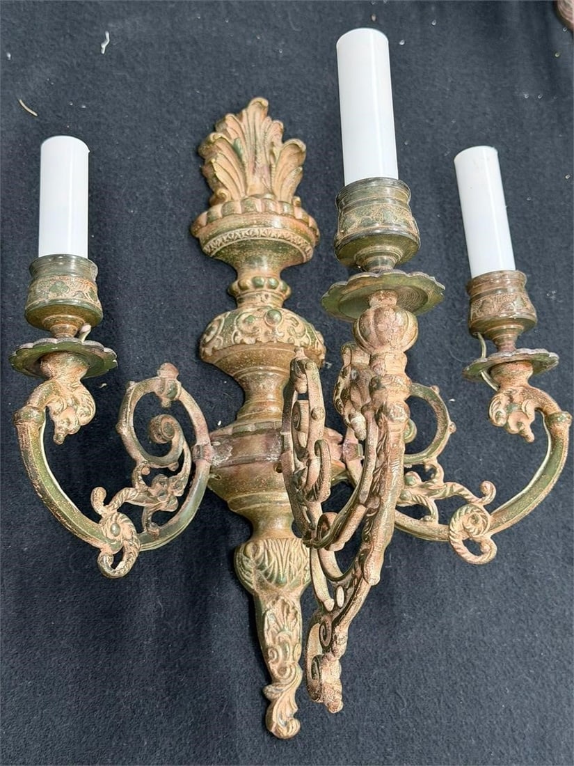 Four Antique French Baroque Wall Candelabra Sconce: Lot of 4 Antique French Baroque-style Wall-mounted candelabra Three Lights per sconce crafted from cast bronze with intricate scrollwork and ornate patterns. Measurements 13"W x 14"H x 7.5" Deep