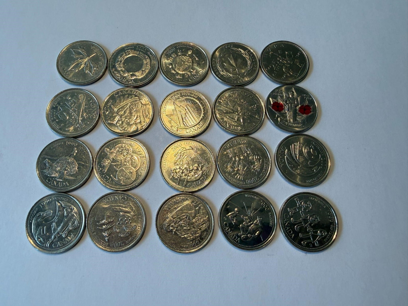 Commemorative Canadian Quarters Bulk Lot of 20: Commemorative Canadian Quarters Bulk Lot of 20(16) Millennium Quarter(4) Single Commemorative Design