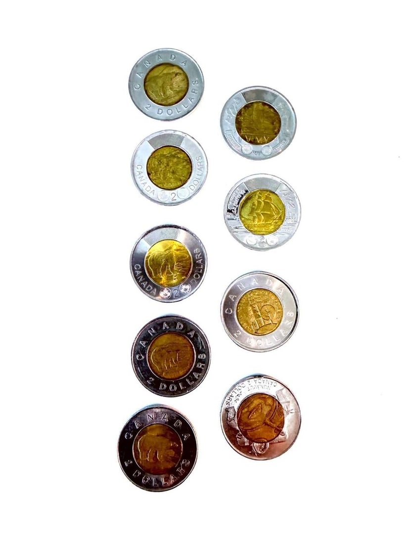 Canada Toonie $2 Two Dollar Coins Lot of 9: Canada Toonie $2 Two Dollars Coin Bi-Metallic Lot of 9Commemorative Coins:1999 Founding of Nunavut2011 Canada's Boreal Forest2012 War of 1812: HMS Shannon2017 Battle of Vimy RidgeClassic:1996 Polar Be
