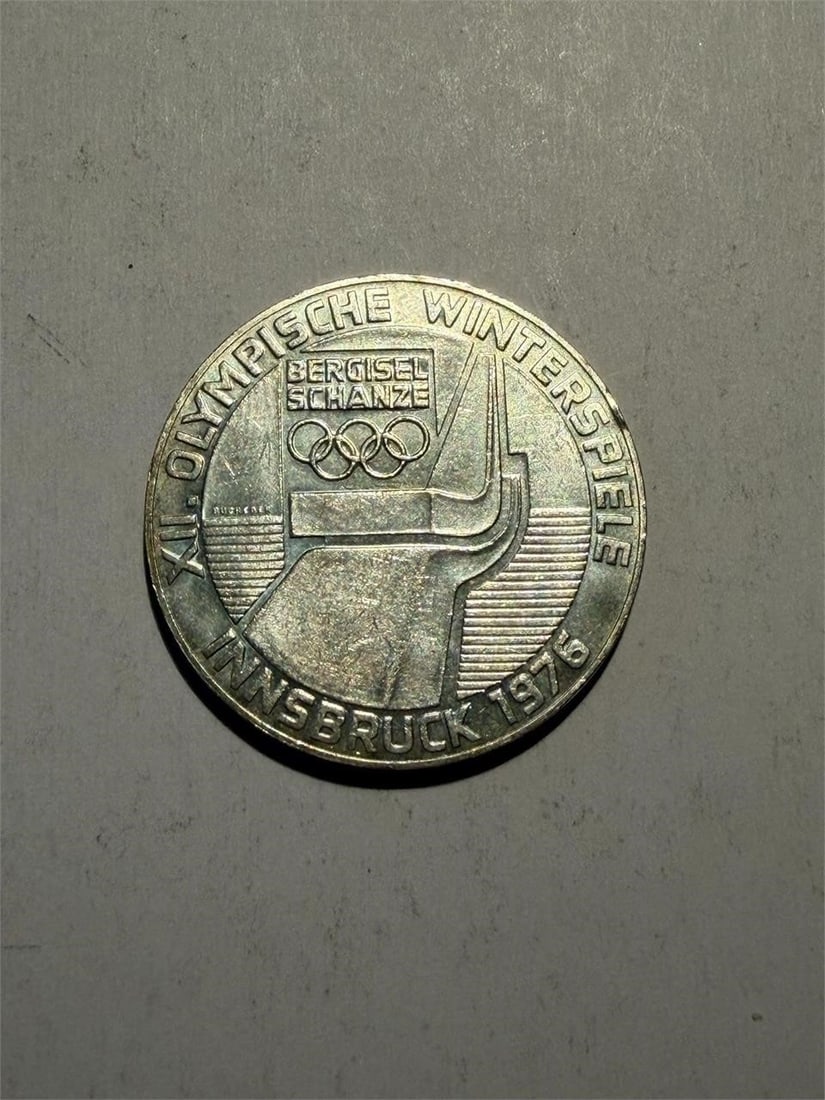 AUSTRIA 100 Shilling Lot of 1 Coin Olympics Silver: AUSTRIA 100 Shilling Lot of 1 CoinOlympics Innsbruck 1976 SILVER .64The 1976 Austria 100 Schilling coin commemorates the XII Winter Olympics held in Innsbruck and features a distinctive design that re