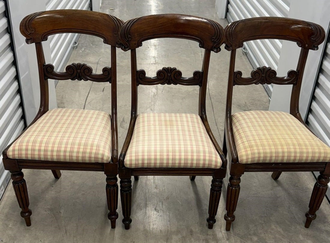 Vintage Set of 3 Side Chairs Regency Style: Vintage Set of 3 Side Chairs Mahogany Regency Style Foliate carved top rails and intricately carved center splat. The set includes turned front legs and upholstered in a checkered fabric. Measurements