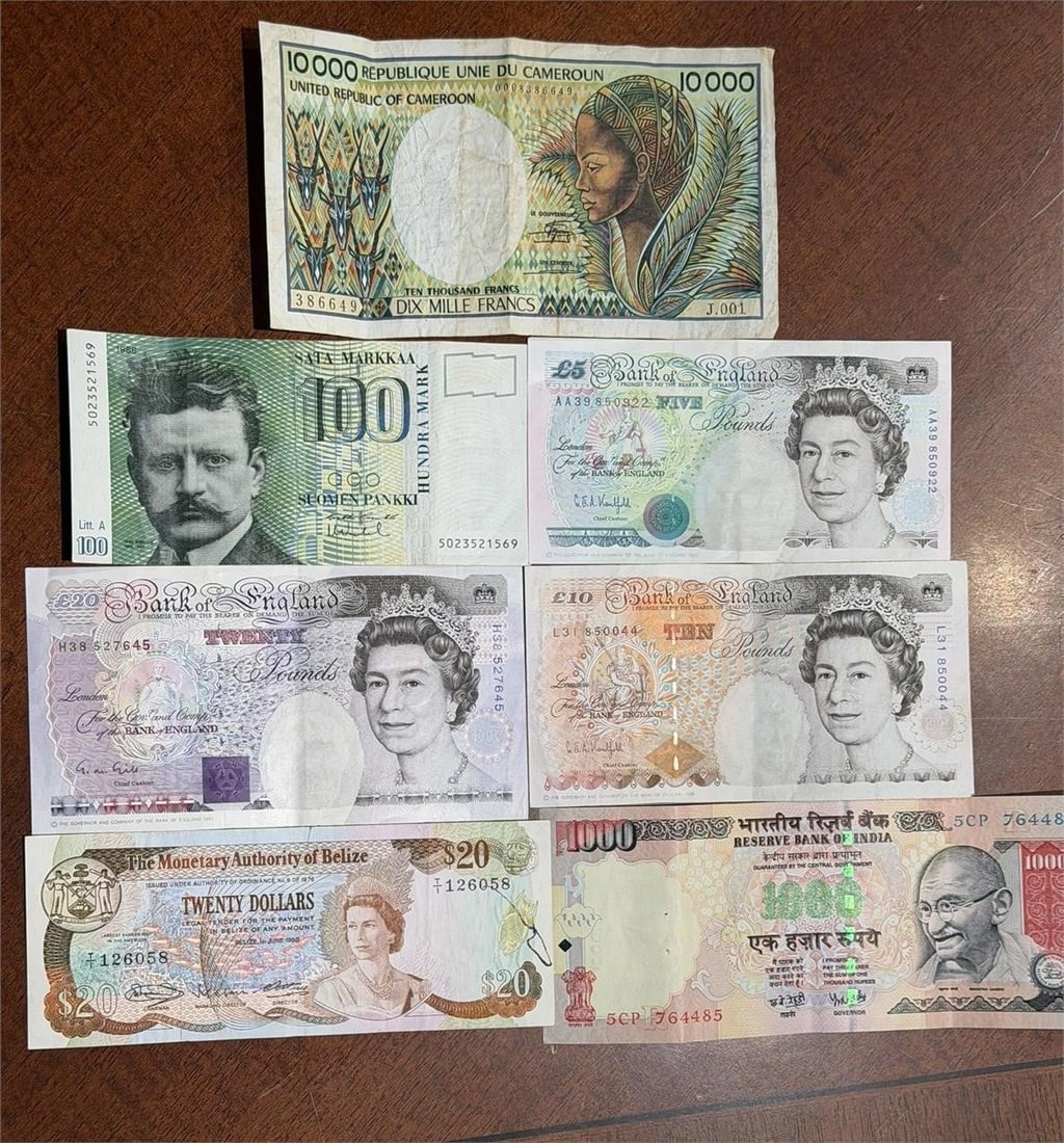 Lot of 7 Seven Foreign Banknotes: Lot of 7 Seven Foreign Banknotes to includeBelize, (3) British, Cameroon, Finland, India