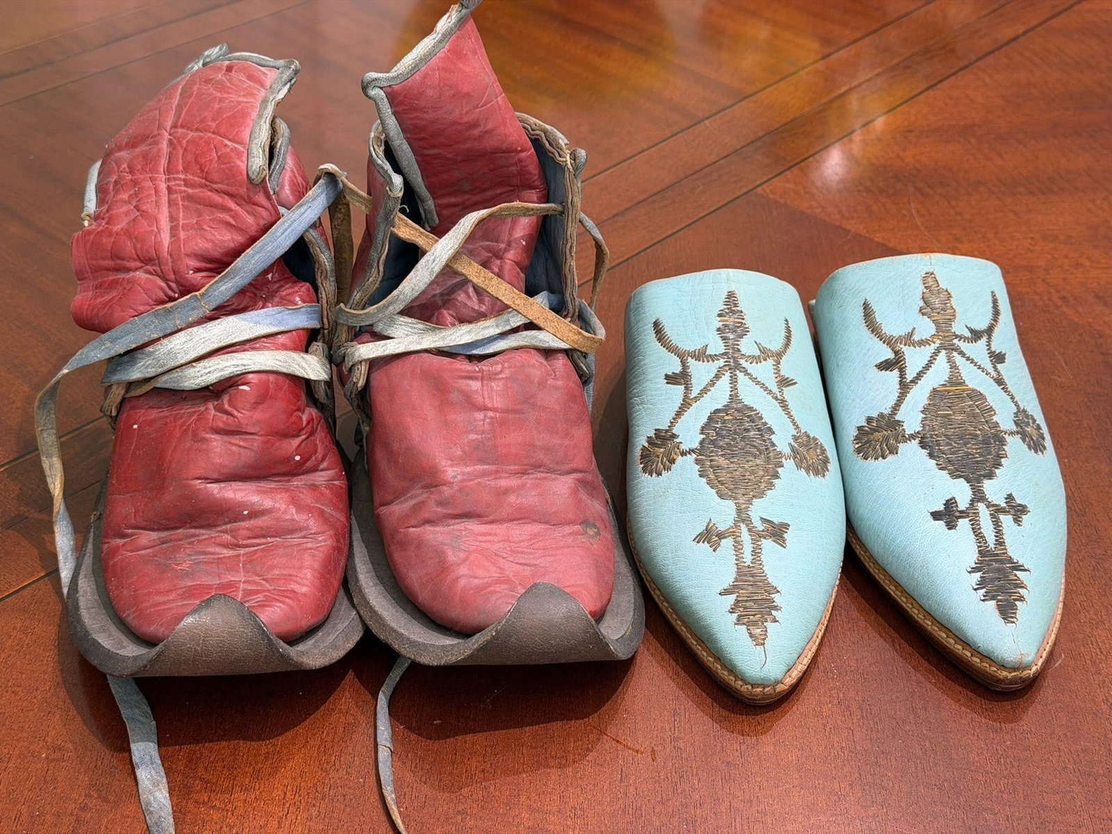 Turkish Shepherd Boots and Moroccan Babouches: Turkish Shepherd Boots and Moroccan BabouchesThe pair of vintage red leather boots with blue laces appear to be historical artifacts, from the 1950s. The light blue leather shoes are vintage Moroccan 