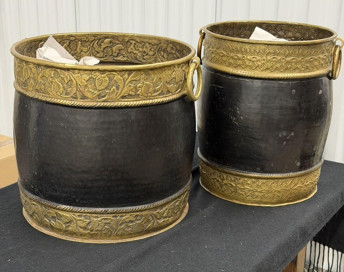 Pair Black & Gold Metal Trash Cans Ring Handles: Pair Black & Gold Metal trash cans featuring ring handles and decorative embossed bandsMeasurements 14"D x 13.5"H and 11"D x 14"H