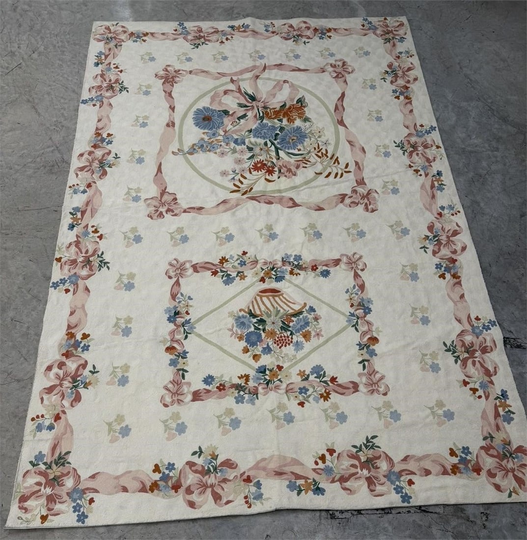 French-style Aubusson Chainstitch Needlepoint Rug: Vintage French-style Aubusson rug characterized by its flat-woven tapestry chain stitch needlepoint design technique and floral medallion designs Measurements 6' x 9' See photo Seam on back is separat