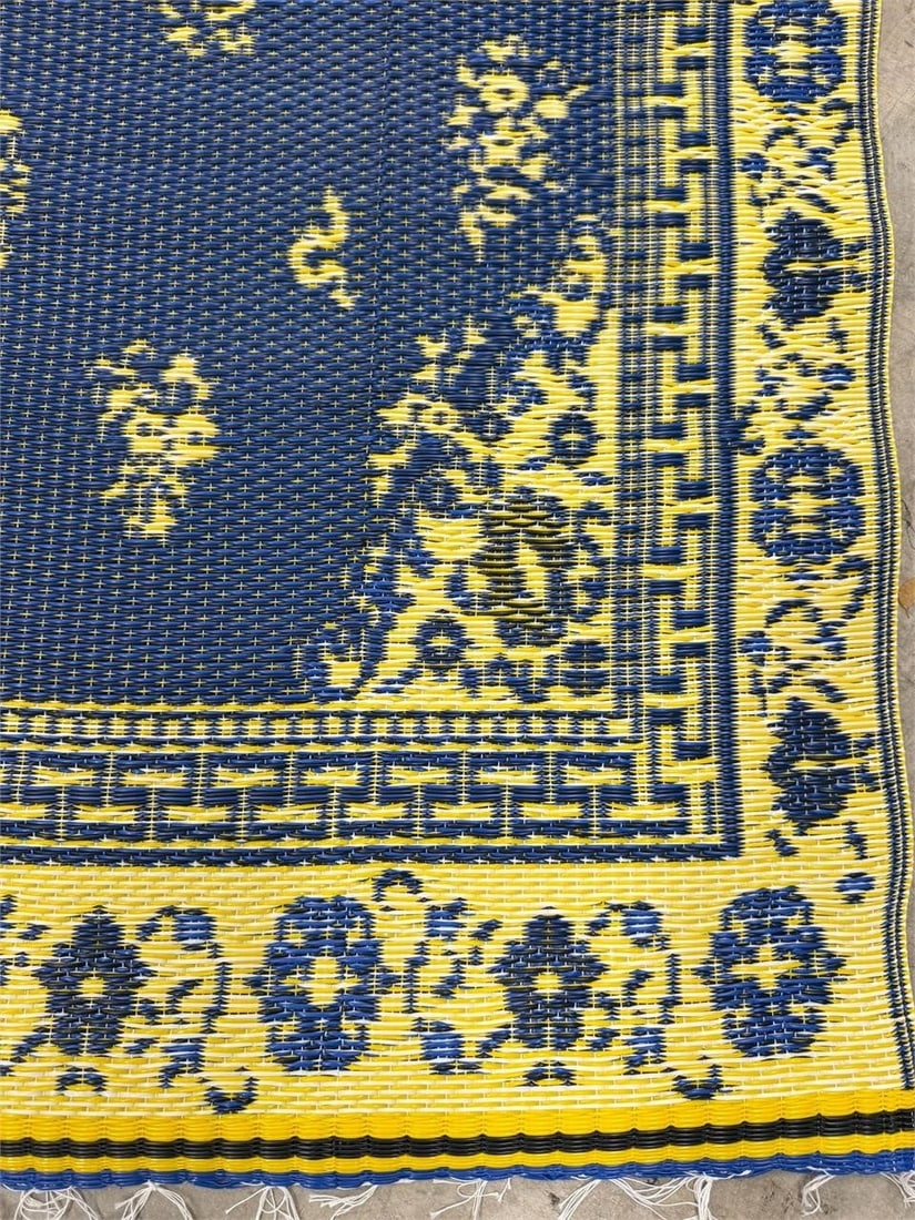 Two Decorative Area Rug 100% Recycled Plastic: Pair (2) Decorative area rug featuring a Chinese-inspired design with a yellow background and blue floral patterns. Made in Thailand 100% Recycled PlasticMeasurements 3' x 5'11"