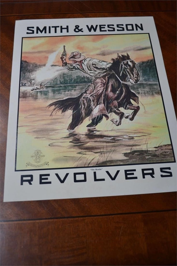 Smith & Wesson Revolver Ad "The Hostile" 11 x 14": Vintage Smith & Wesson Revolver Advertisement "The Hostile" Measures 11 x 14" This great replica of an original Smith & Wesson advertising poster has been printed on heavyweight archival matte art pap