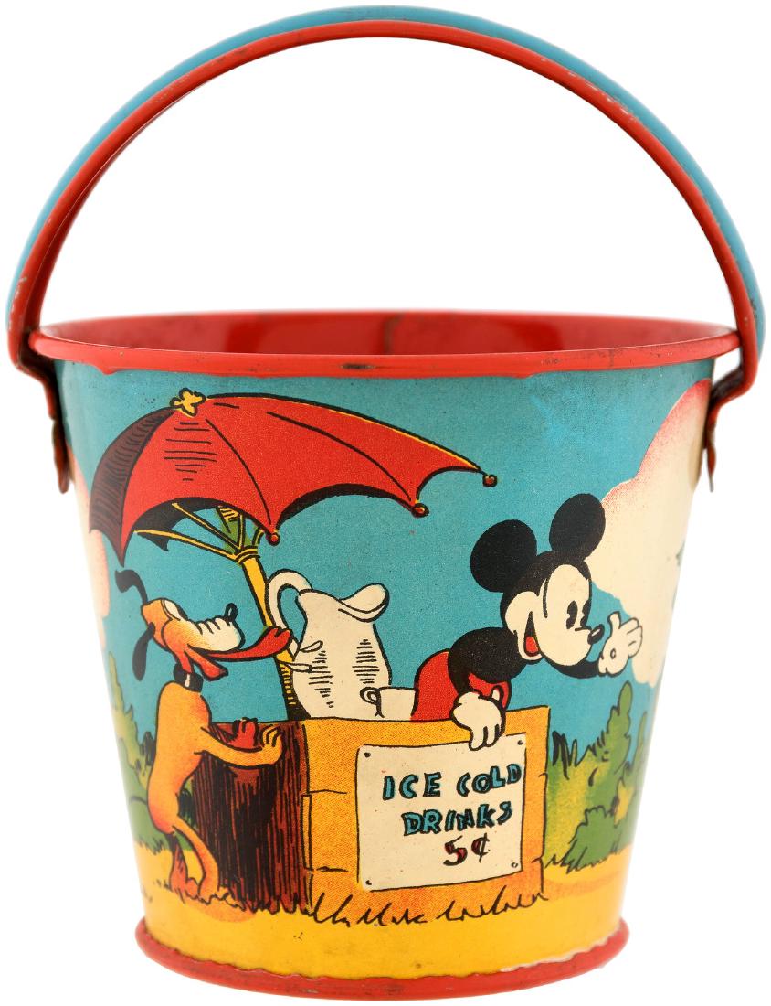 MICKEY MOUSE & FRIENDS SMALL SAND PAIL.: 2-7/8" tall (4.5" tall to top of raised handle) tin litho by Ohio Art. © WDE, 1930s. Pail depicts Mickey Mouse running a beverage stand while trying to get the attention of Minnie Mouse and Clarabell