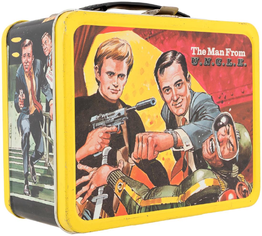 "THE MAN FROM U.N.C.L.E." METAL LUNCHBOX WITH THERMOS.: King-Seeley Thermos Co. ©1966 MGM Inc. Lunchbox features illustrations by comic book/"Mad" Magazine artist Jack Davis. Front panel features art of main characters from TV show, w/action/portrait imag