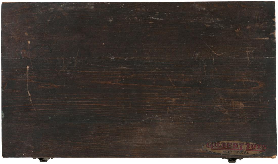 "GILBERT ELECTRICAL SET" BOXED 1920 SET.: 11x18-7/8x3.25" deep wooden case contains A.C. Gilbert Co. set No. 3004, 1920. Case has metal fasteners and lid has "Gilbert Toys Electrical" decal and this shows scattered wear. Underside of lid has