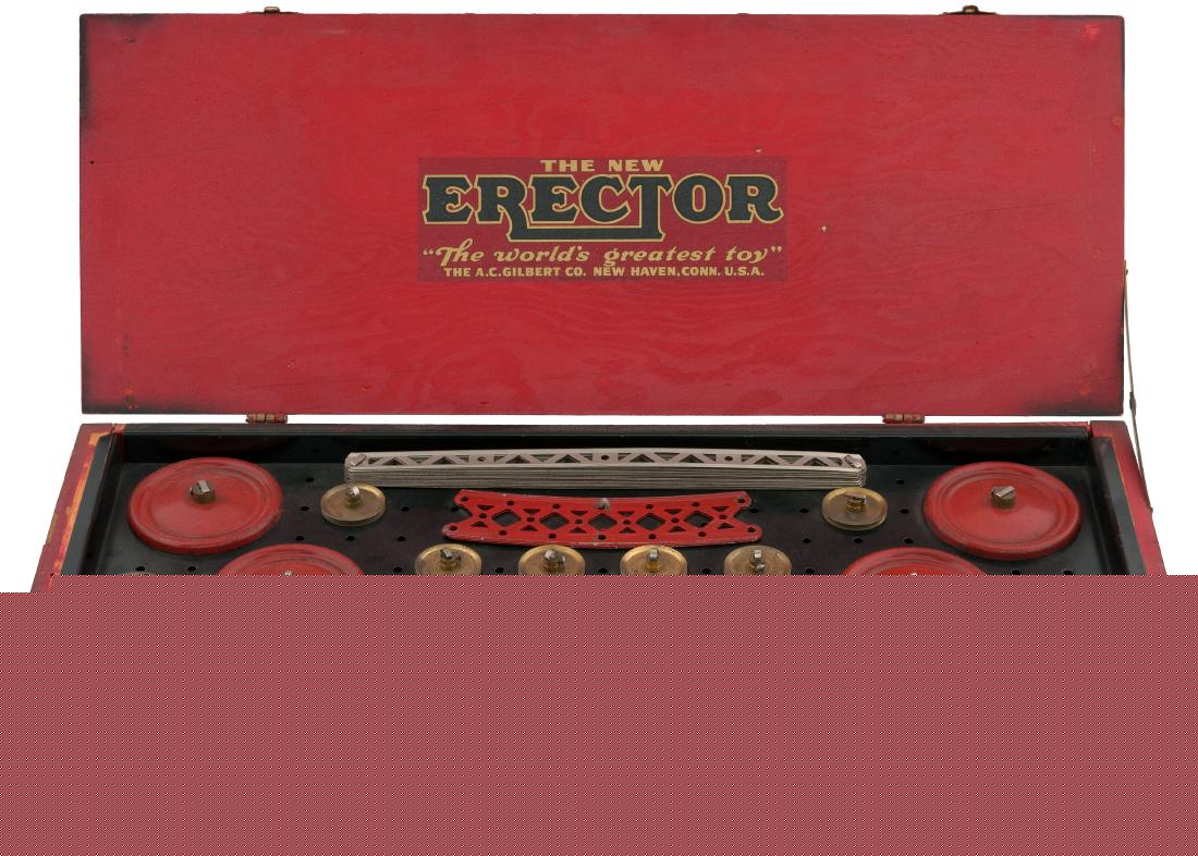 GILBERT "THE NEW ERECTOR" BOXED 1929 SET.: 8.25x21.5x5" deep painted wood (red w/black corners) hinged-lid box contains 1929 Erector set No. 7 by A.C. Gilbert Co. Lid features "The New Erector" decal and underside features same decal. Front si