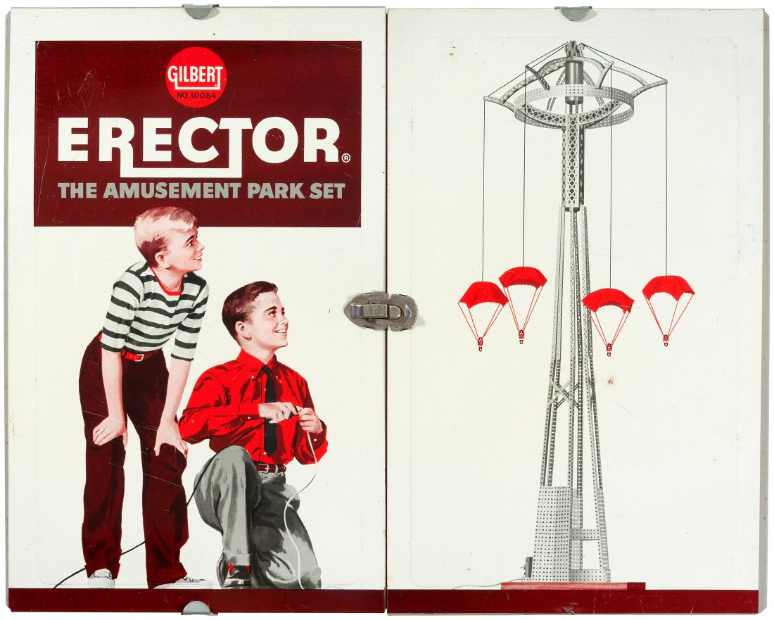 GILBERT "THE AMUSEMENT PARK SET" BOXED 1960 SET.: 16.25x20.5x2-7/8" deep tin litho metal case contains A.C. Gilbert Co. 1960 set No. 10084 that allowed user to build "various amusement park rides/attractions, including "High-Wire Bicycle Rider, Merry