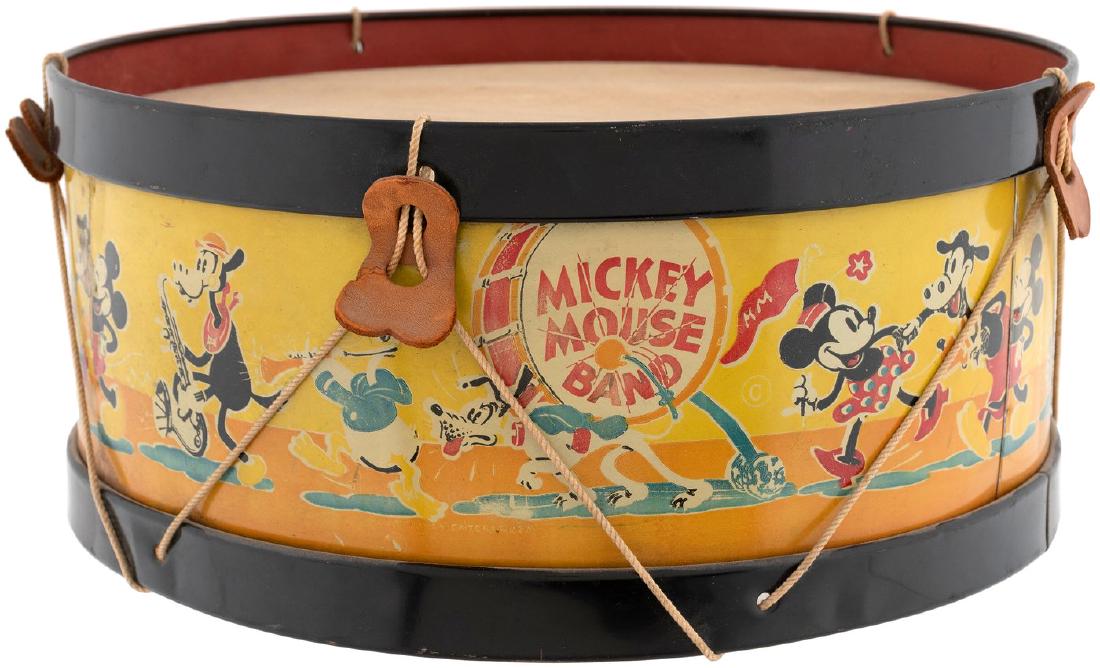 "MICKEY MOUSE BAND" DRUM (SIZE VARIETY).: 13" dia. by 5-7/8" tall; the largest of three sizes (see middle size, item #1688) produced by Noble & Cooley, who produced many different Mickey toy instruments (see tambourine, item #1686). 1930s. Ti