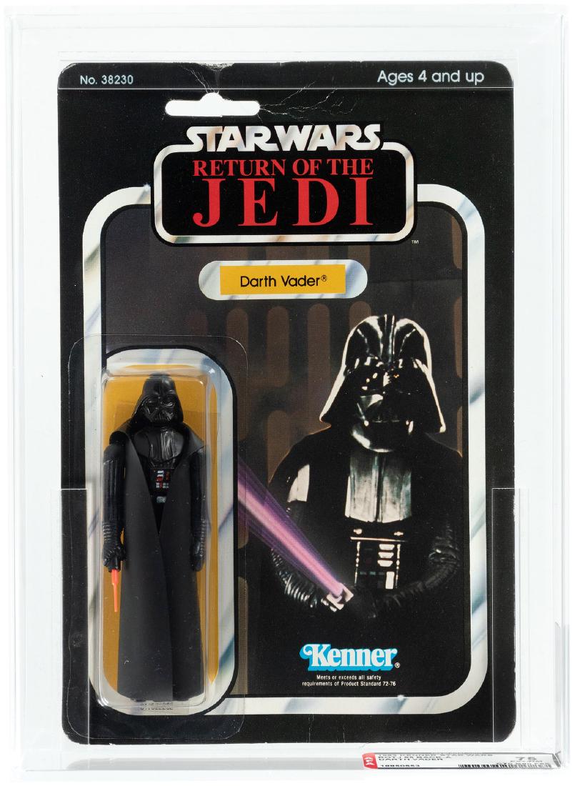 "STAR WARS: RETURN OF THE JEDI - DARTH VADER" 65 BACK-A: STAR WARS: RETURN OF THE JEDI - DARTH VADER 65 BACK-A AFA 75 EX+/NM. AFA graded and encapsulated 65 Back-A blister card contains 4.25" tall action figure of Darth Vader from Kenner's popular 1983 "Sta