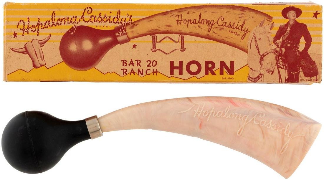 HOPALONG CASSIDY BOXED BAR 20 HORN & FIELD GLASSES.: HOPALONG CASSIDY BOXED BAR 20 HORN & FIELD GLASSES. Pair of boxed 1950s Hopalong Cassidy store items. Box contains 11" long plastic/rubber horn "For Tricycle/Bicycle/Scooter/Automobile." Box is missin
