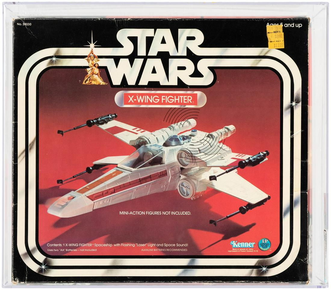 "STAR WARS - X-WING FIGHTER" AFA 50 Q-VG.: "STAR WARS - X-WING FIGHTER" AFA 50 Q-VG. AFA graded and encapsulated box contains "1 X-Wing Fighter Spaceship With Flashing 'Laser' Light And Space Sound!" from Kenner's popular 1978 "Star Wars" toyl