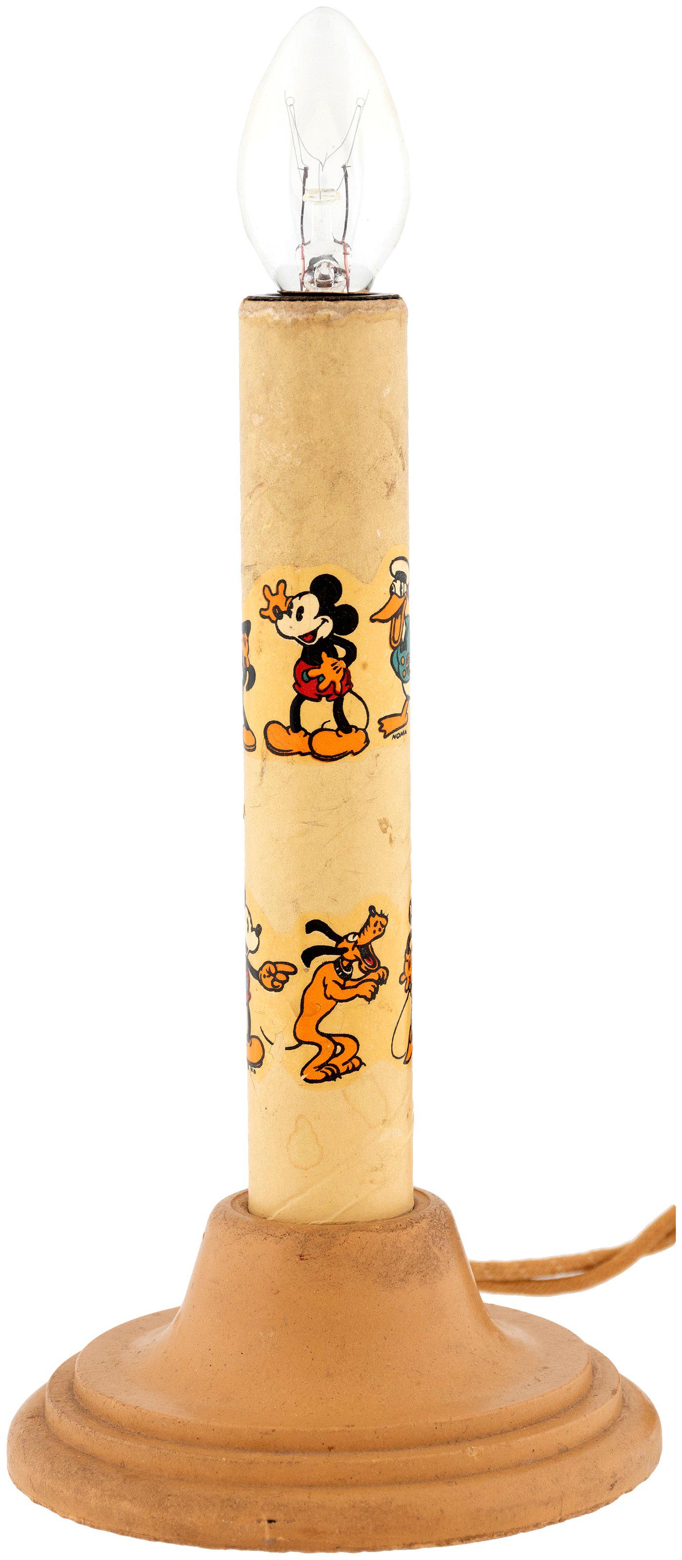 MICKEY MOUSE & FRIENDS NOMA CANDLESTICK LIGHT.: MICKEY MOUSE & FRIENDS NOMA CANDLESTICK LIGHT. 7.75" tall (to top of vintage glass lightbulb) on 3.5" dia. Bakelite type material base. Candlestick is cardboard tube w/pair of different wrap-around de